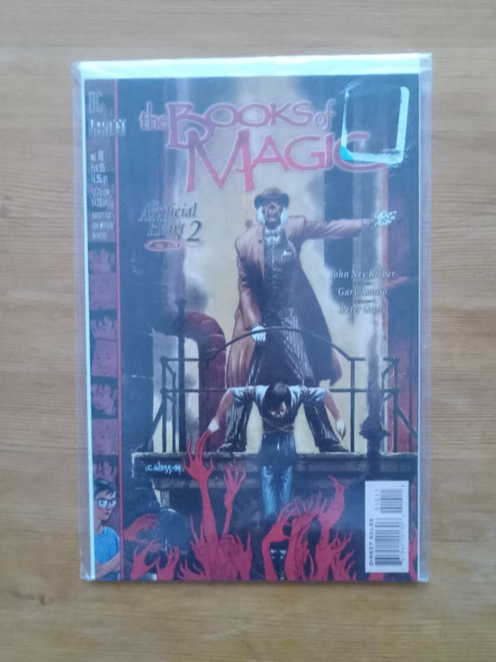 Pair of Books of Magic comic books in protective sleeves